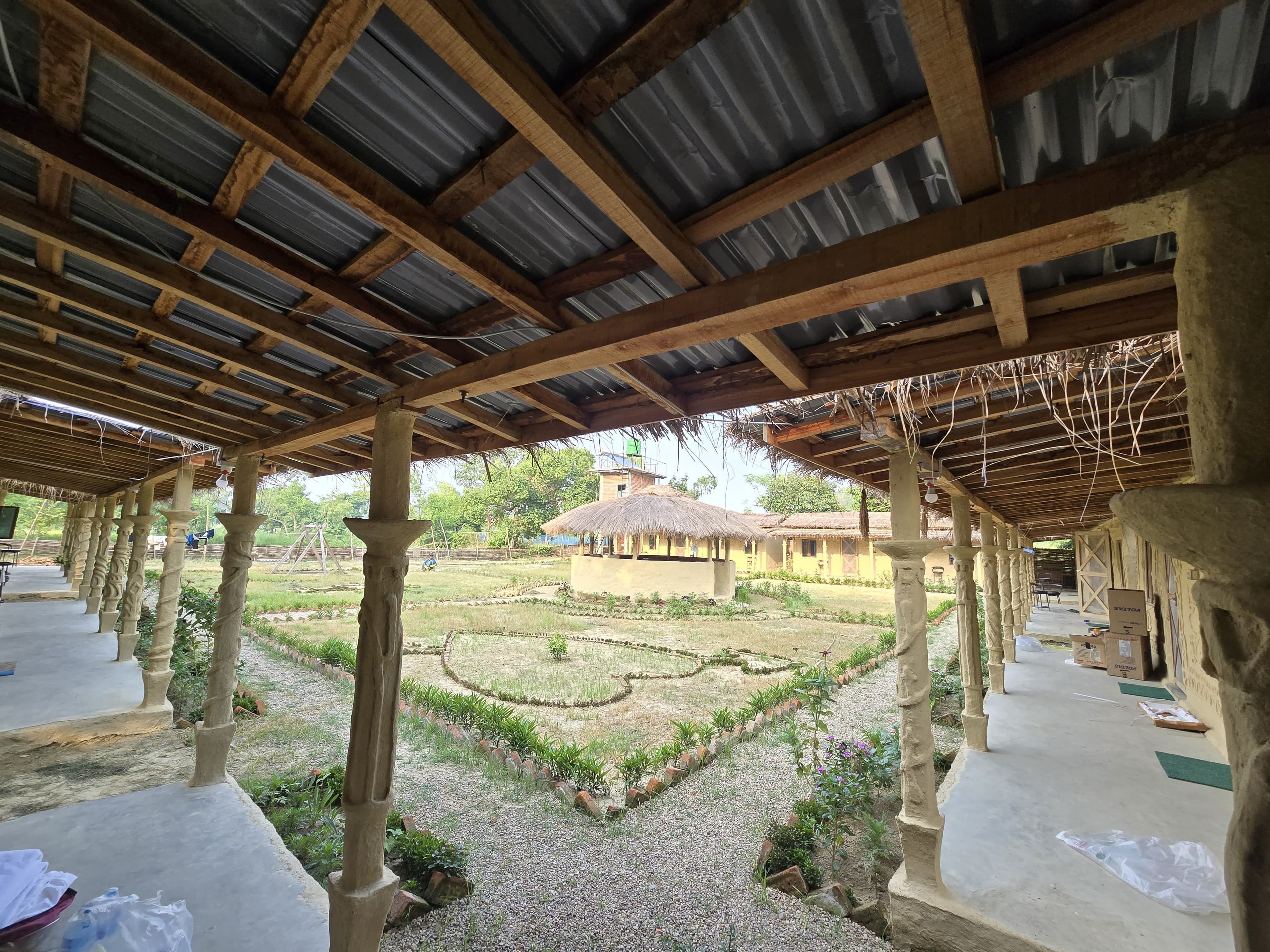 Garden pathway between traditional cottages
