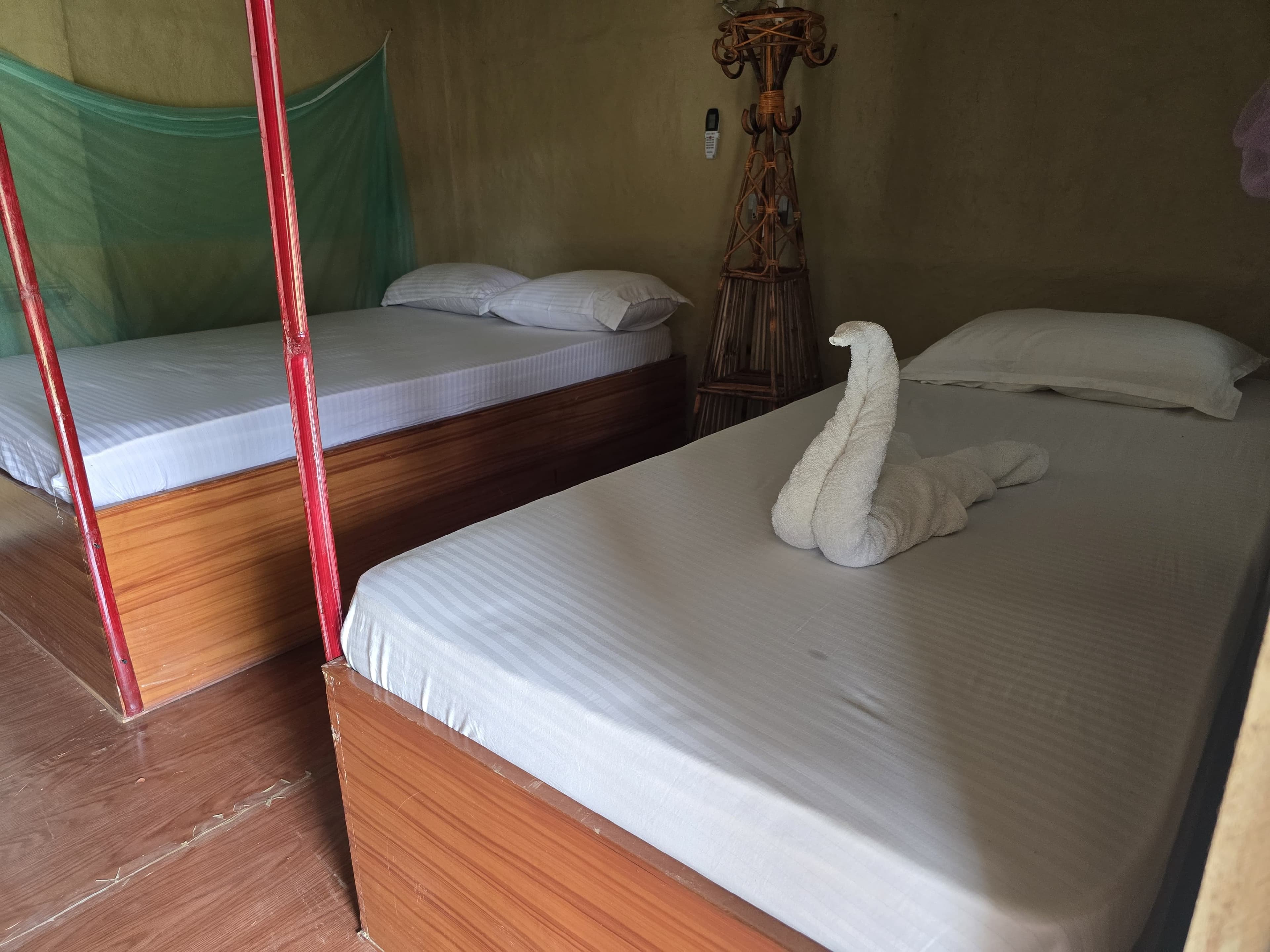 Twin room with towel art swan decoration